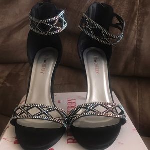 Black heels with rhinestone details